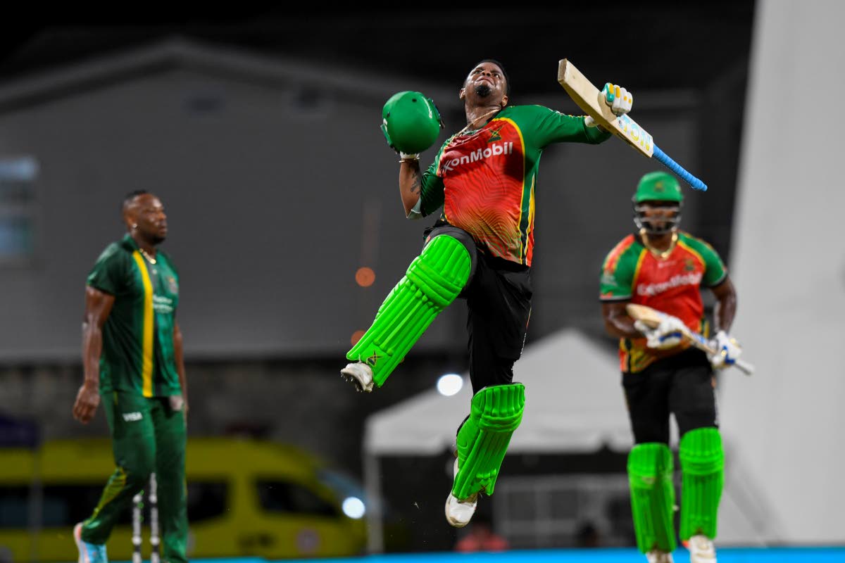Courtesy of CPLT20 Guyana Amazon Warriors batsman Shimron Hetmyer, clebrates scoring a century during a Republic Bank Caribbean Premier League cricket match against the Jamaica Kingsmen on Friday night.