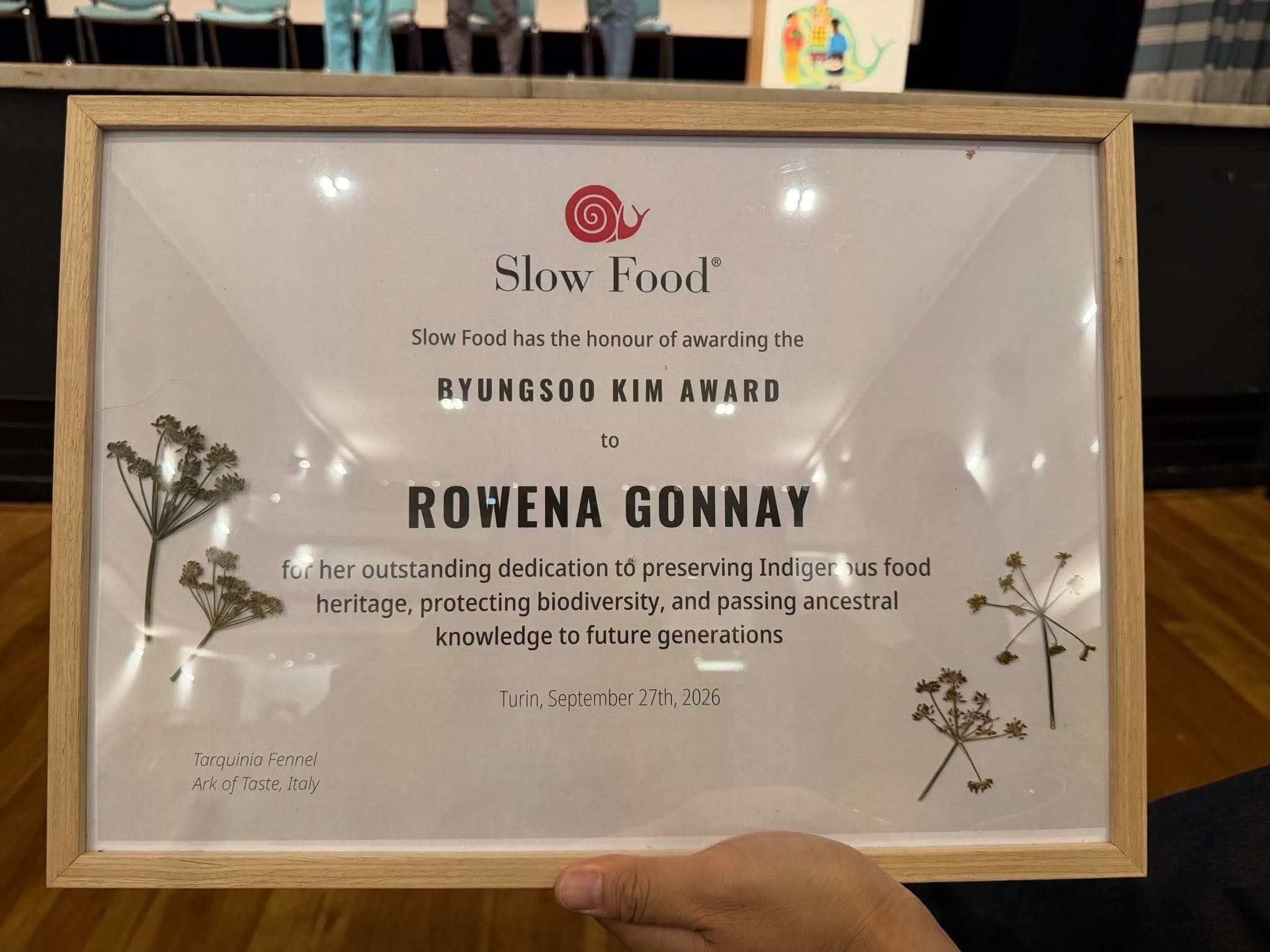The 2026 ByungSoo Kim Award certificate honoring Rowena Gonnay during the Terra Madre Salone del Gusto in Turin, Italy. Photo from Gonnay’s Facebook page
