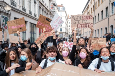 Students block the entrance to Ampere high school in Lyon.