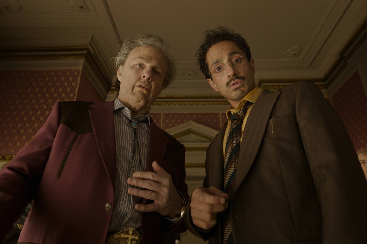 This image released by Warner Bros. Pictures shows Tom Cruise (left) and Riz Ahmed in a scene from ‘Digger’.