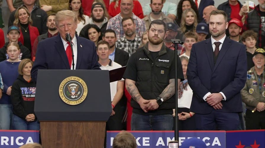 Trump invites mechanics onstage at Alaska rally to deliver pardons