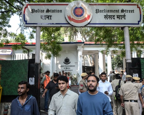 Saurav Das and Ashutosh Ranka walk out from a police station