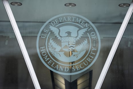 The Department of Homeland Security seal etched on a glass door at its Washington headquarters